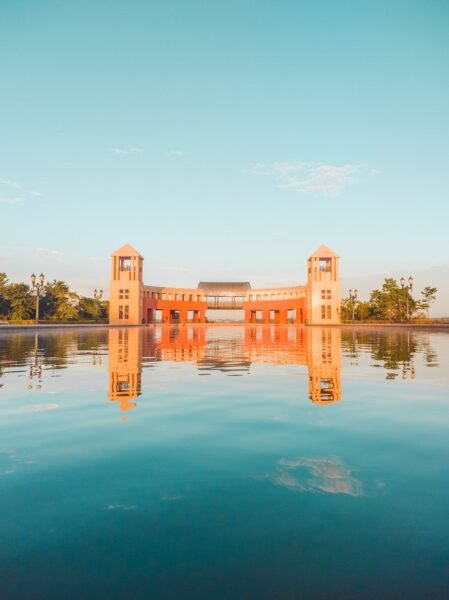 lake and building in tangua park in curitiba