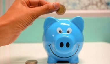 person putting coin in a piggy bank